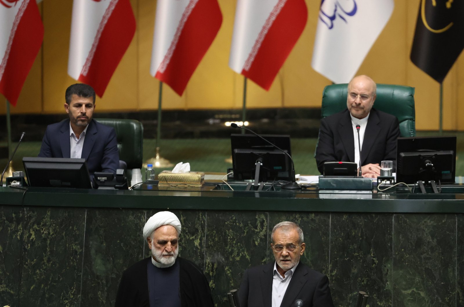 Iranian President-elect Masoud Pezeshkian (Below-Right) is sworn-in as new president, during an inauguration ceremony at the Iranian parliament in Tehran, Iran, July 30, 2024. (EPA Photo)