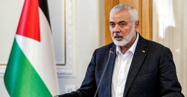 Ismail Haniyeh, the Doha-based political bureau chief of the Palestinian resistance movement Hamas, speaks to the press after a meeting with the Iranian foreign minister in Tehran on March 26, 2024. (AFP File Photo)