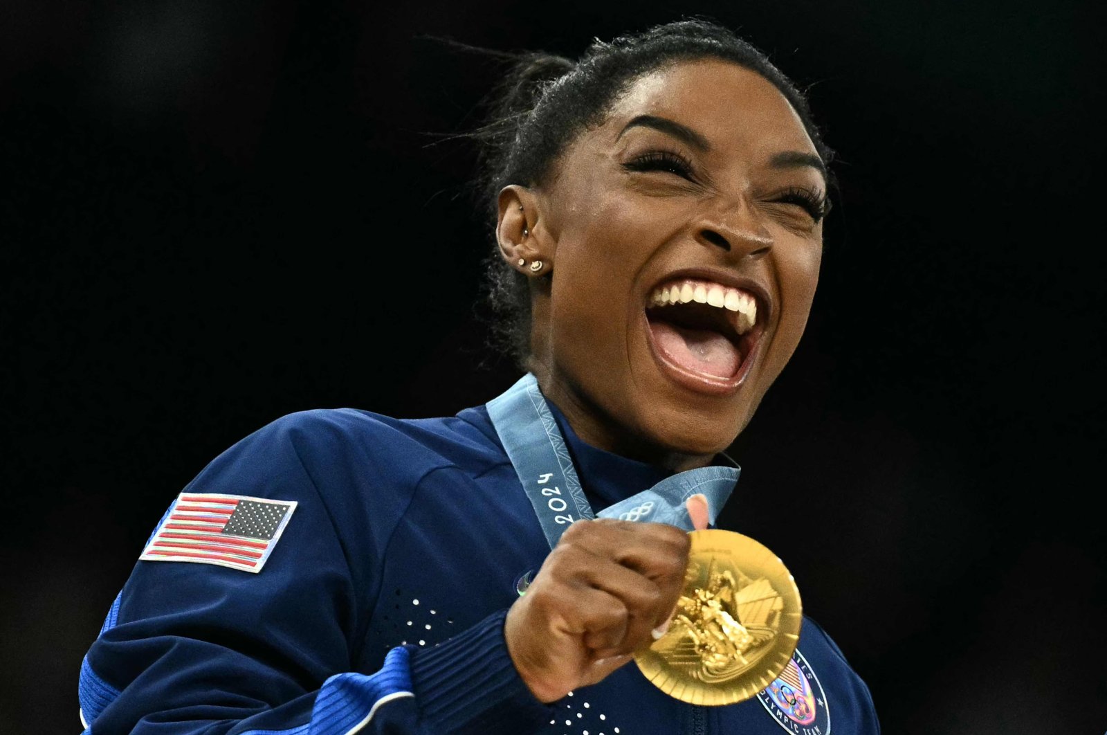 U.S.&#039; Simone Biles poses with the gold medal during the podium ceremony for the artistic gymnastics women&#039;s team final at the Paris 2024 Olympics, Bercy Arena, Paris, France, July 30, 2024. (AFP Photo)