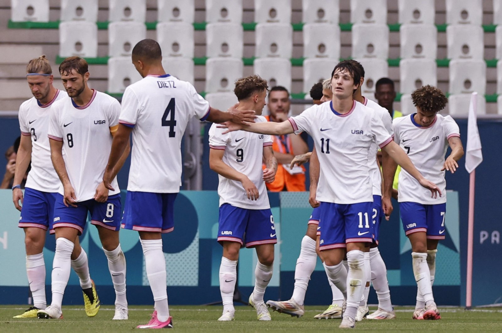 USMNT players celebrate a goal during the Paris 2024 Olympics men&#039;s football Group A against Guinea at the Geoffroy-Guichard Stadium, Saint-Etienne, France, July 30, 2024. (Reuters Photo