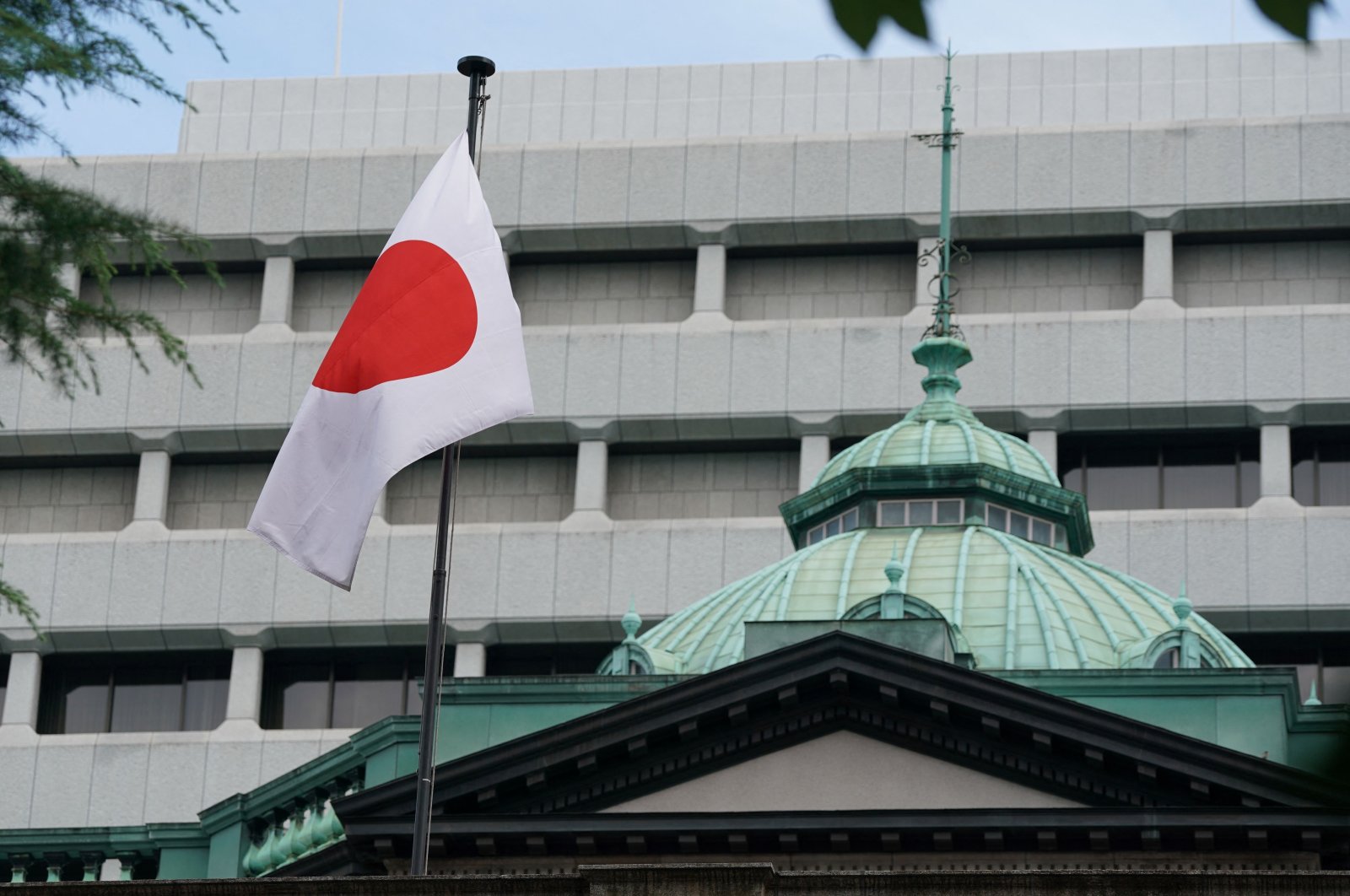 The Japanese national flag is seen at the Bank of Japan (BoJ) headquarters, Tokyo, Japan, July 31, 2024. (AFP Photo)