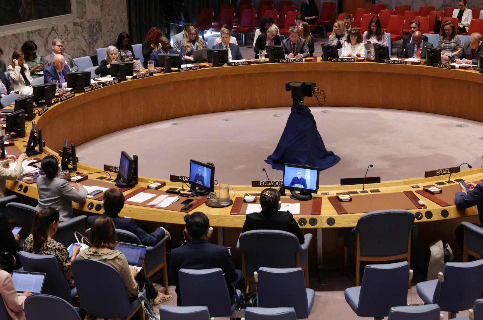 Members of the U.N. Security Council listen as Muhannad Hadi, Deputy Special Coordinator and Resident Coordinator for the Office of the United Nations Special Coordinator for the Middle East Peace Process, speaks during a meeting on the situation in the Middle East, including the Palestinian question at the United Nations headquarters, July 26, 2024. (Getty Images via AFP)