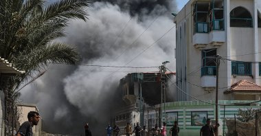 Internally displaced Palestinians run for cover following an Israeli attack, Gaza Strip, Palestine, July 27, 2024. (EPA Photo)