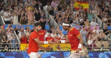 Spain's Carlos Alcaraz (L) and Rafael Nadal react during their Paris 2024 Olympics Men's Doubles Quarterfinals match against U.S.' Austin Krajicek and Rajeev Ram at Roland-Garros Stadium, Paris, France, July 31, 2024. (Reuters Photo)
