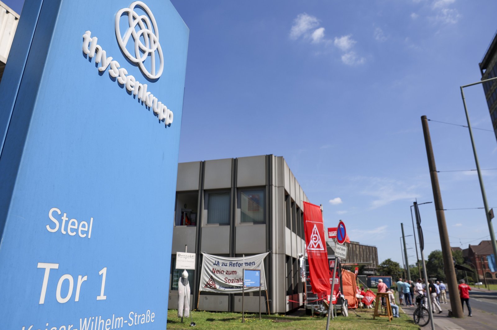 Workers of the steel division of Thyssen-Krupp protest in front of the Thyssen Krupp Steel headquarters in Duisburg, Germany, July 29, 2024.