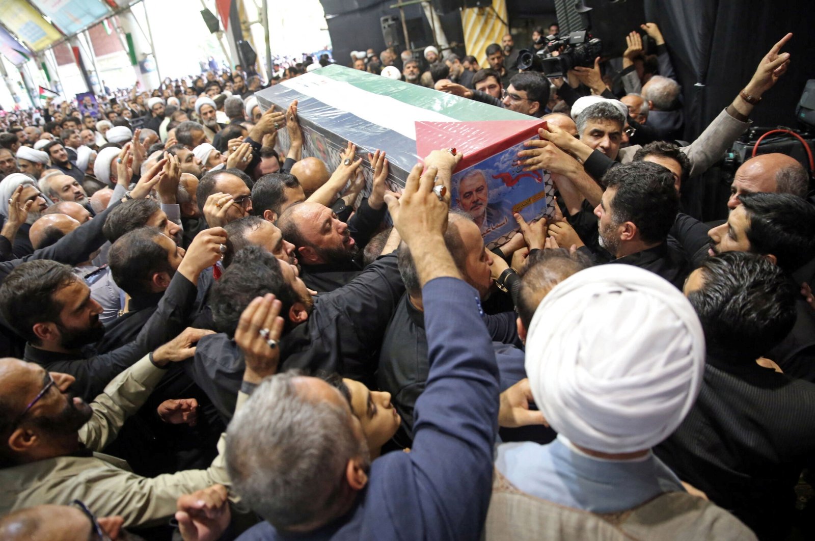 Mourners carry the coffin of assassinated Hamas chief Ismail Haniyeh during his funeral ceremony in Tehran, Iran, Aug. 1, 2024. (Reuters Photo)