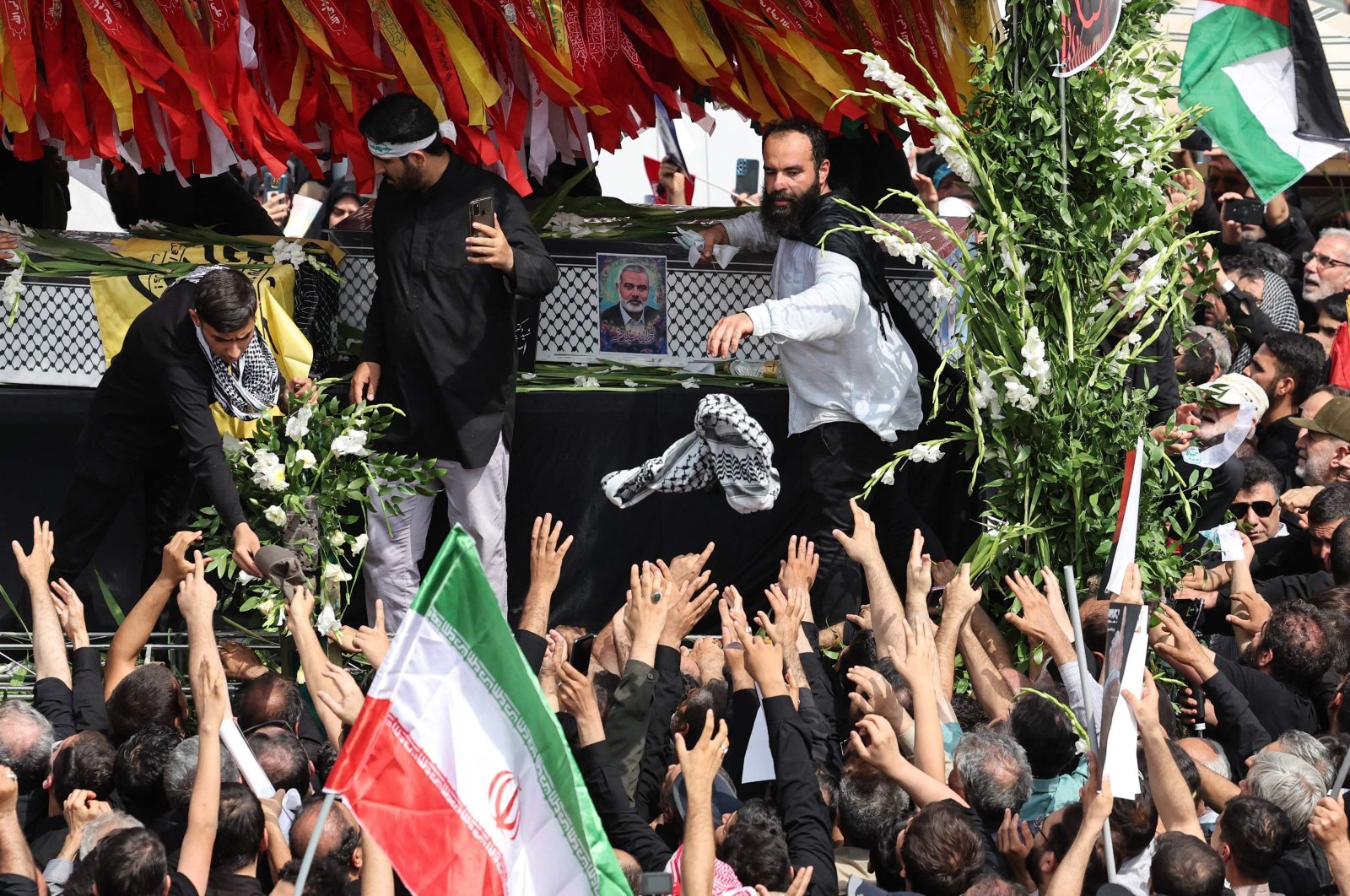 Iranians take part in a funeral ceremony for the late Hamas leader Ismail Haniyeh, Tehran, Iran, Aug. 1, 2024. (AFP Photo)