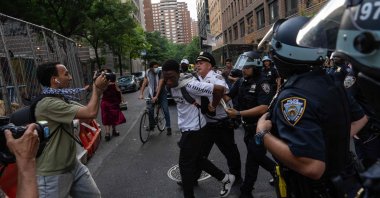 A pro-Palestine supporter is detained by New York Polic Department officers during a march against Israel's brutal war in Gaza, New York City, U.S., July 18, 2024. (AFP Photo)