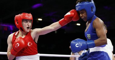 Türkiye&#039;s Esra Yıldız Kahraman (L) in action against Jucielen Cerqueira Romeu of Brazil at the Paris 2024 Olympics, Paris, France. (Reuters Photo)