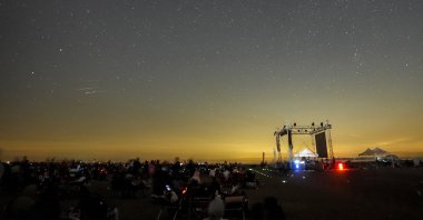 People watch the at an event in Karacabey, Bursa, western Turkiye, Aug. 4, 2024. (AA Photo)