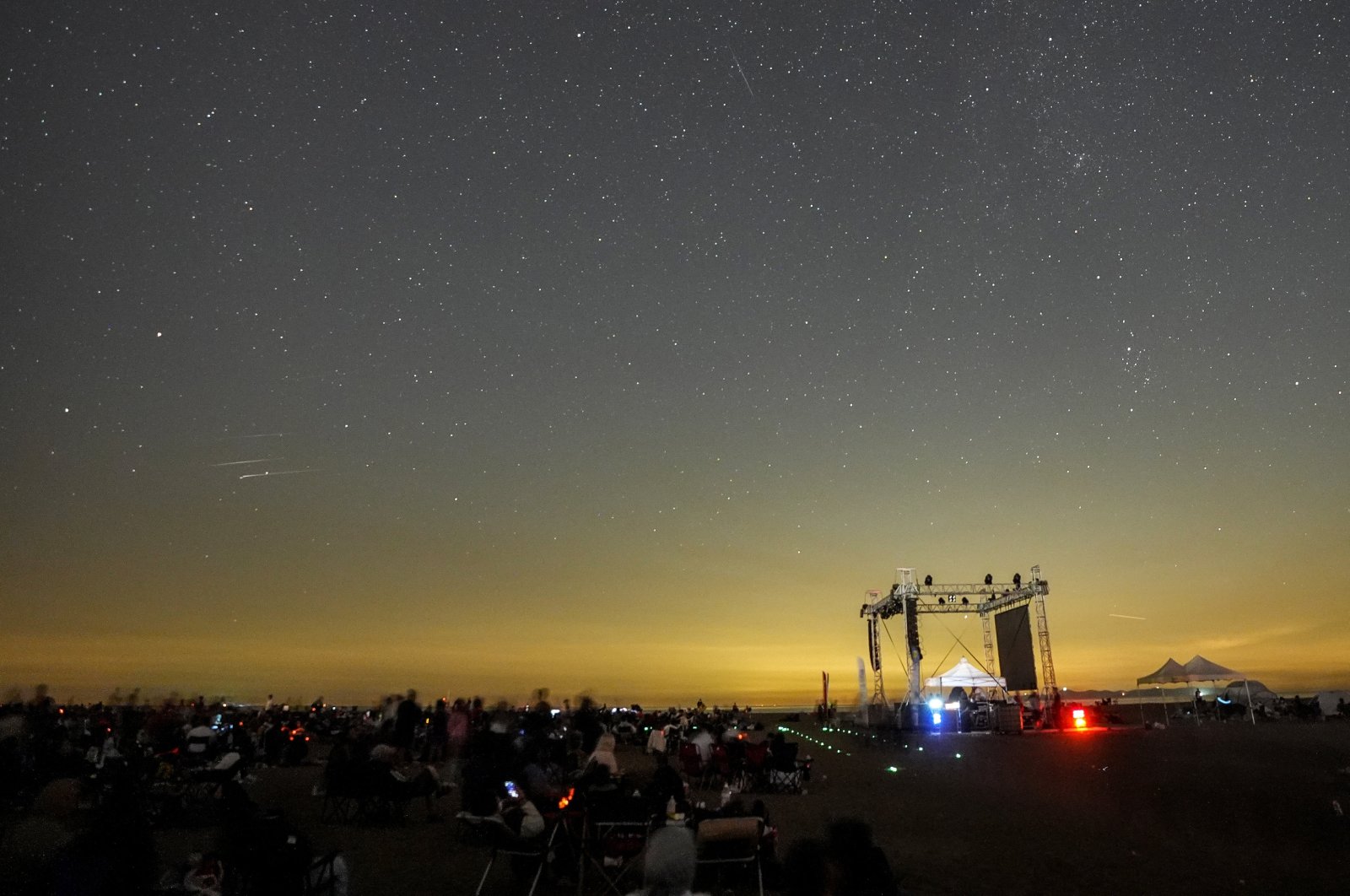 People watch the at an event in Karacabey, Bursa, western Turkiye, Aug. 4, 2024. (AA Photo)