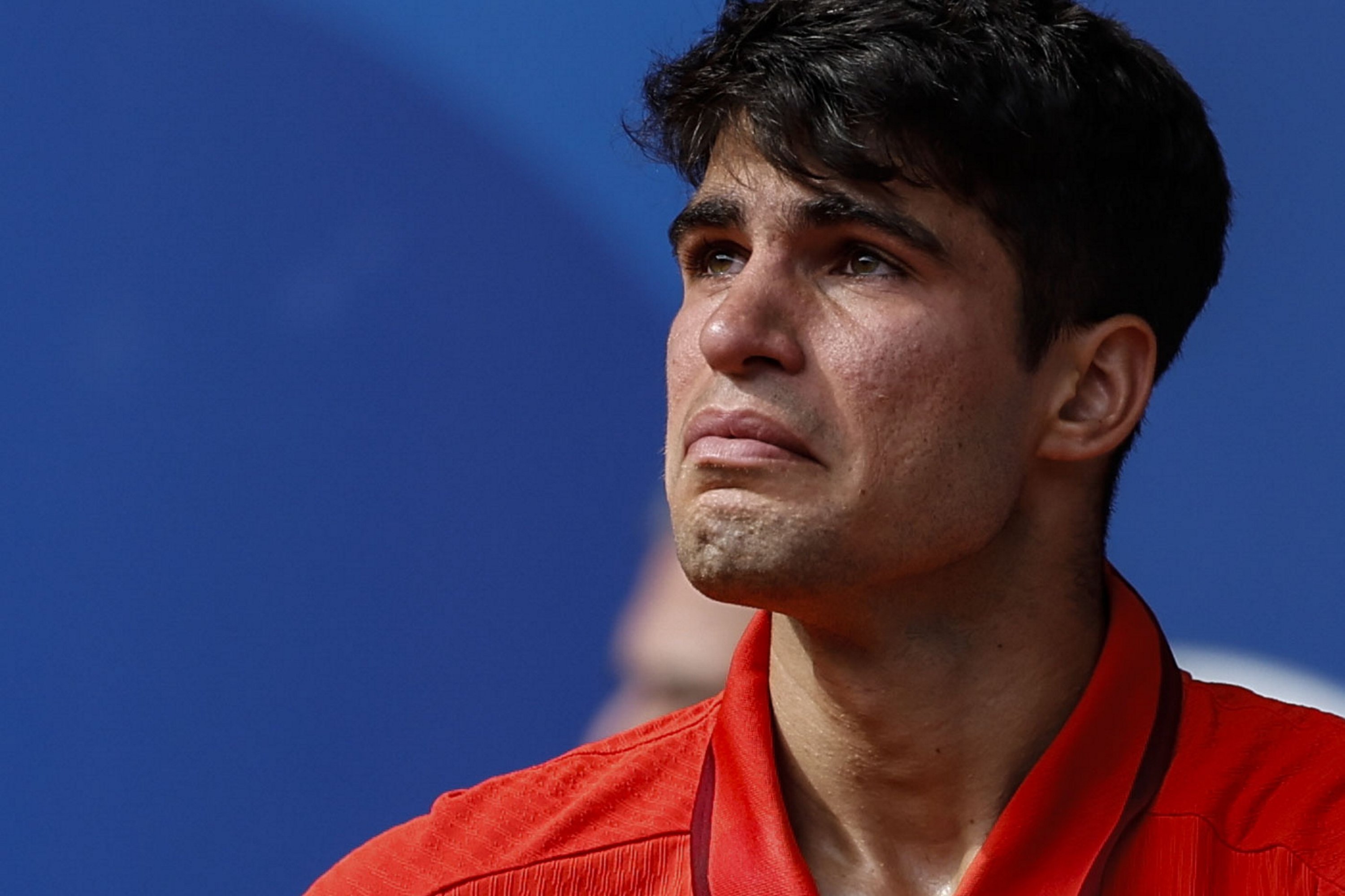 Carlos Alcaraz of Spain reacts after losing against Novak Djokovic of Serbia in their men's singles gold medal match of the tennis competitions in the Paris 2024 Olympic Games, at the Roland Garros, Paris, France, Aug. 4, 2024. (EPA Photo)