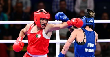 Algeria's Imane Khelif (L) in action with Hungary's Anna Luca Hamori during the Paris 2024 Olympics, Boxing, Women's 66 kg. quarterfinal at the North Paris Arena, Villepinte, France, Aug. 3, 2024. (AA Photo)
