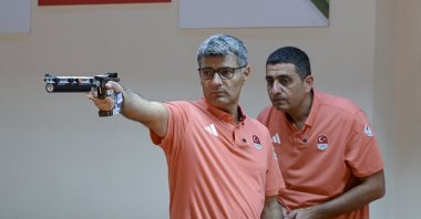 Türkiye's Paris Olympics shooting silver medalist Yusuf Dikeç trains with his coach, Ankara, Türkiye, Aug. 2, 2024. (AA Photo)