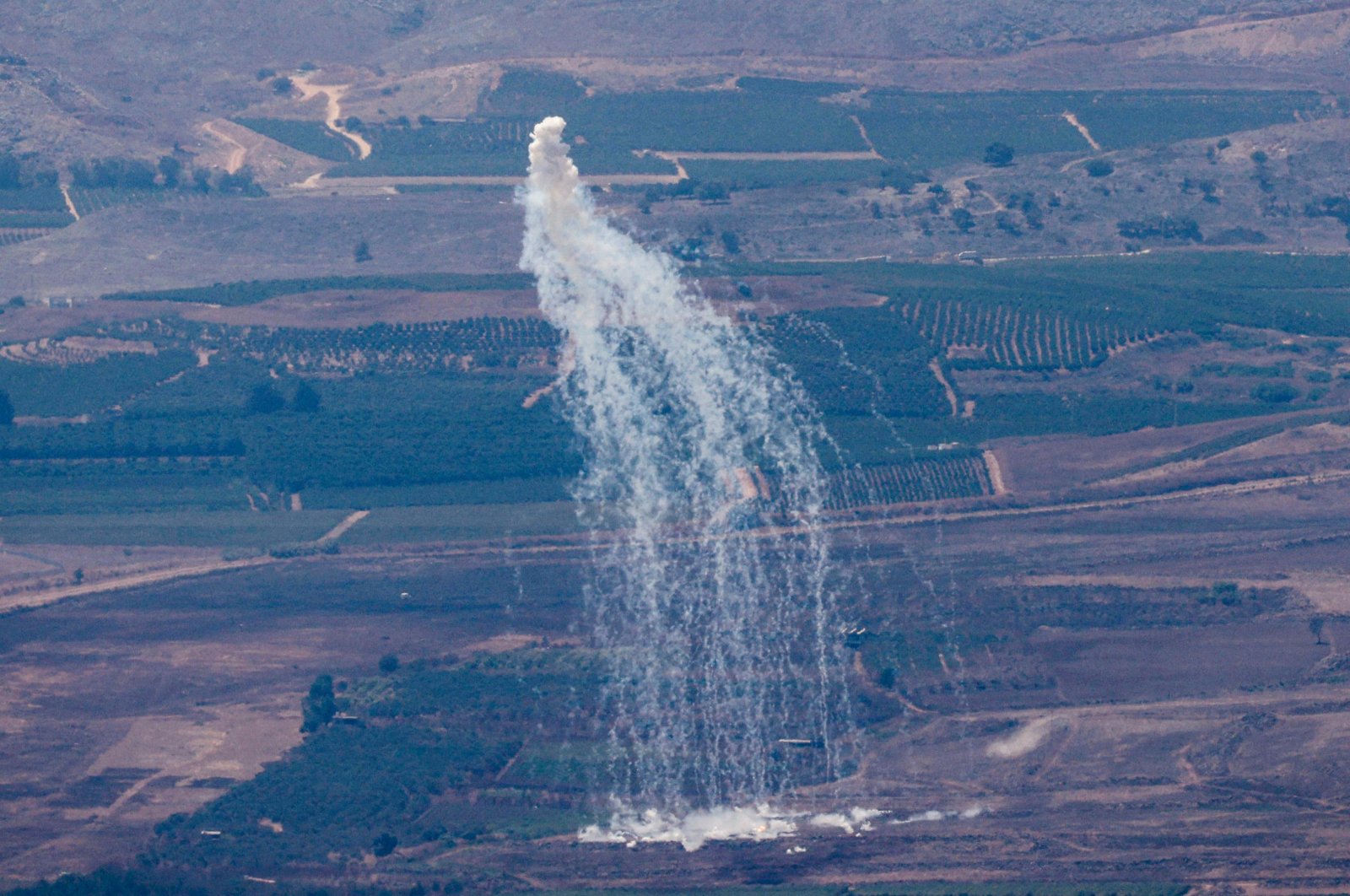 This picture taken from northern Israel near the border with Lebanon shows smoke billowing during Israeli bombardment above the Lebanese Wazzani area on Aug. 5, 2024. (AFP Photo)