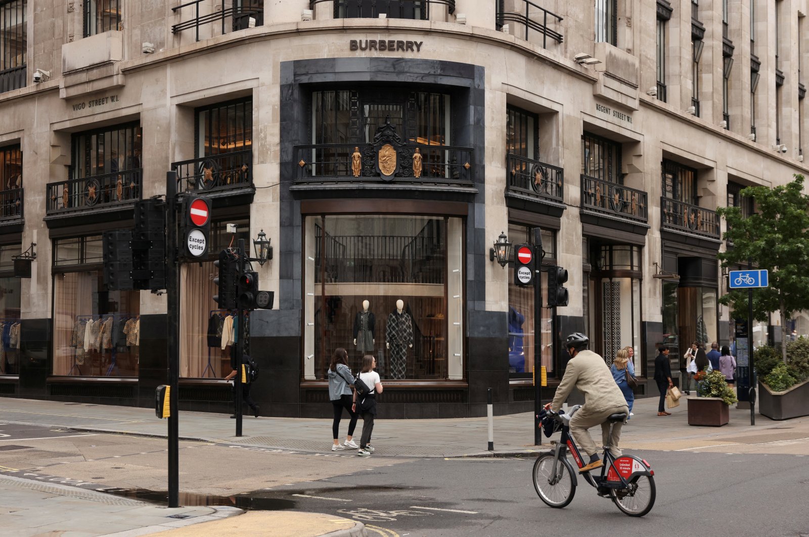 People walk past a Burberry store on Regent Street in London, U.K., July 15, 2024. (Reuters Photo)