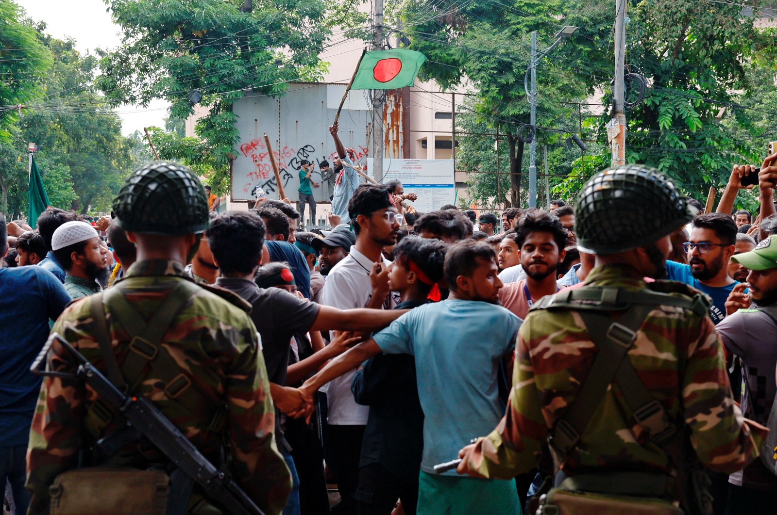 People celebrate the resignation of Prime Minister Sheikh Hasina in Dhaka, Bangladesh, Aug. 5, 2024. (Reuters Photo)