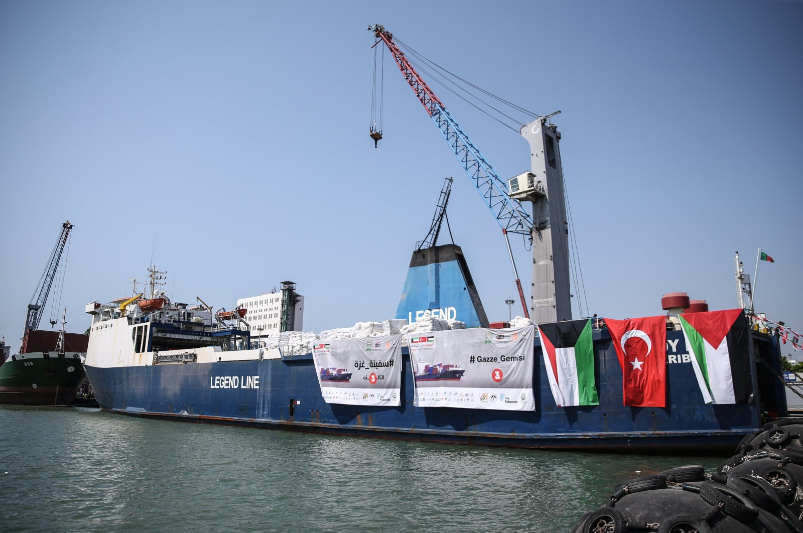 The ship carrying humanitarian aid for Gaza from the IHH Humanitarian Relief Foundation and Kuwaiti organizations departs from Mersin International Port, Türkiye, Aug. 6, 2024. (AA Photo)