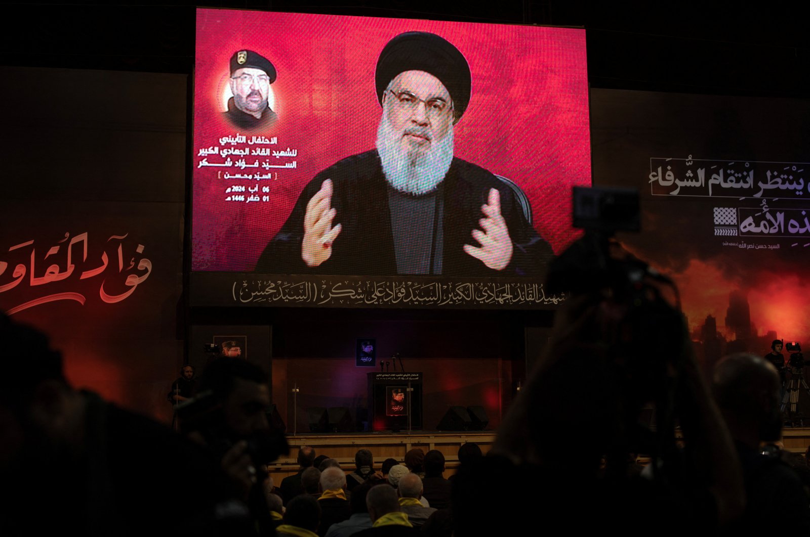 Supporters listen to a speech of Hezbollah leader Sayyed Hassan Nasrallah via a video, during a commemorative ceremony marking the first week since the killing of Hezbollah&#039;s top commander Fuad Shukr, in the southern suburbs of Beirut, Lebanon Aug. 6, 2024. (Reuters Photo)