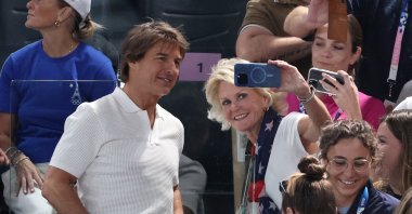 Actor Tom Cruise with fans in the stand during the Women&#039;s Qualification, Paris, France, July 28, 2024. (Reuters Photo)
