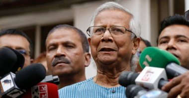 Bangladeshi Nobel laureate Muhammad Yunus (2nd R) addresses the media in Dhaka, Bangladesh, March 3, 2024. (AFP Photo)
