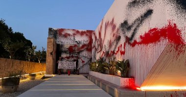 Futuro Vegetal climate activist group members stand in front of vandalized Lionel Messi&#039;s mansion, Ibiza, Spain, Aug. 6, 2024. (AA Photo)