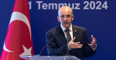 Treasury and Finance Minister Mehmet Şimşek speaks during a meeting of the Turkish Industry and Business Association (TÜSIAD), Istanbul, Türkiye, July 11, 2024. (Reuters Photo)