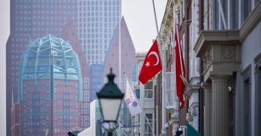 Flags at half-mast following the death of Palestinian ex-prime minister and Hamas leader Ismail Haniyeh, at the Turkish Embassy in The Hague, the Netherlands, Aug. 2, 2024. (EPA Photo)