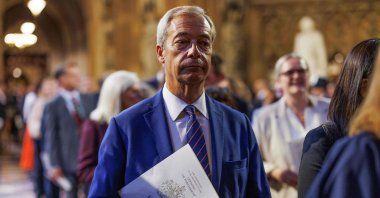 Reform U.K. leader Nigel Farage reacts as he processes through the Central Lobby during the State Opening of Parliament at the Houses of Parliament, in London, July 17, 2024. (AFP Photo)
