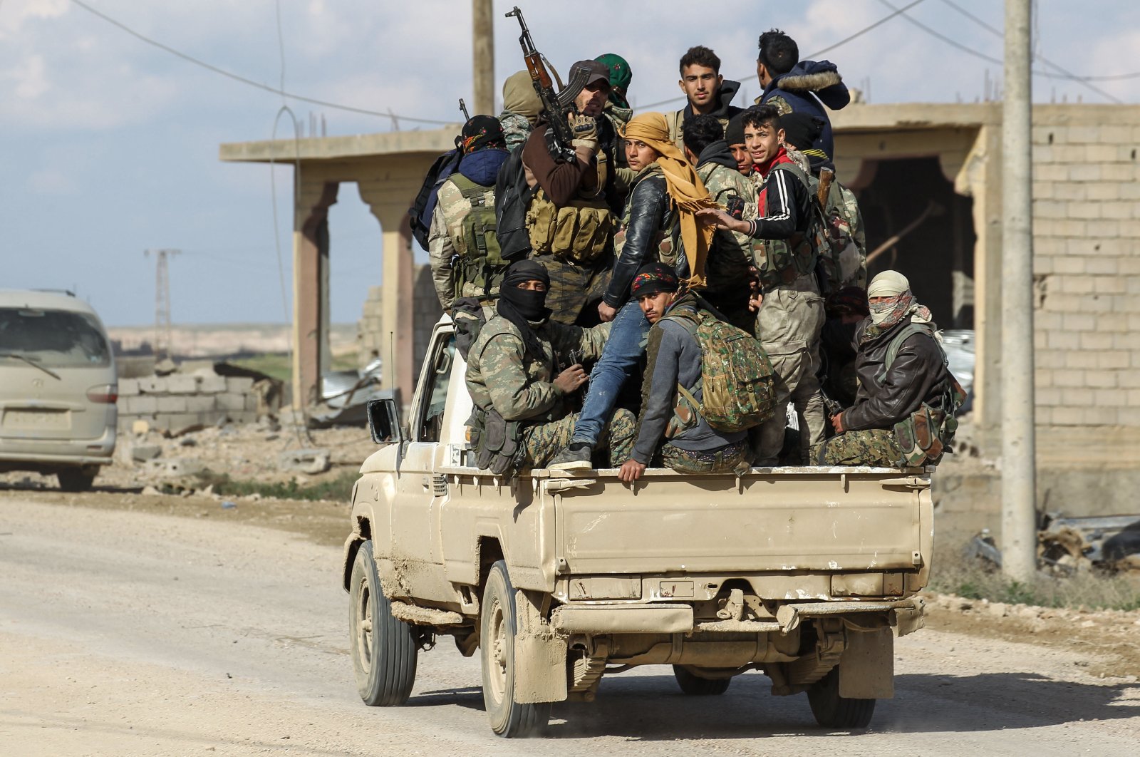 Members of the PKK/YPG patrol through a village in Deir el-Zour, Syria, Feb. 18, 2019. (Getty Images)