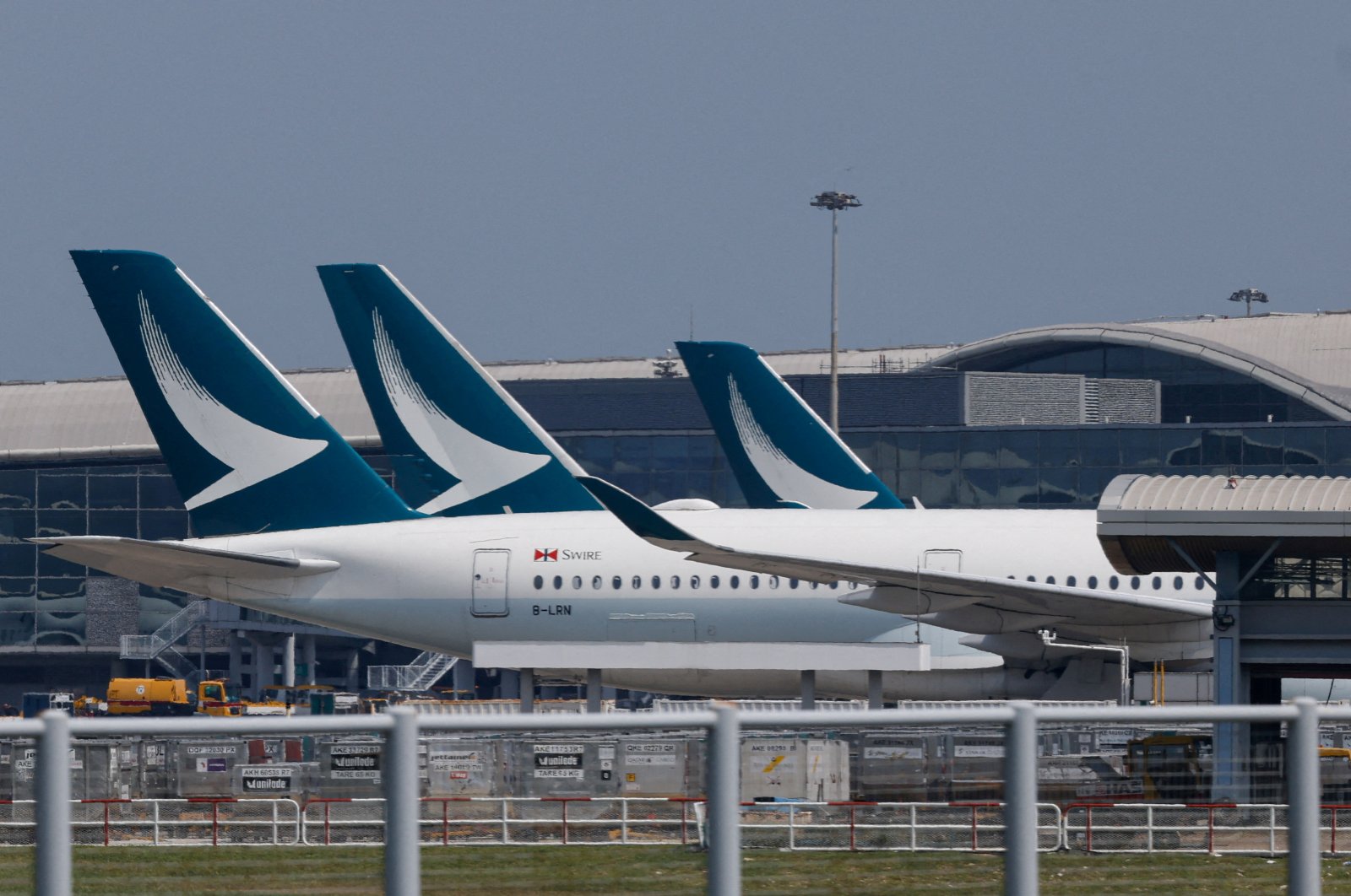 Cathay Pacific aircraft are seen parked at Hong Kong International Airport, Hong Kong, China, Aug. 7, 2024. (Reuters Photo)