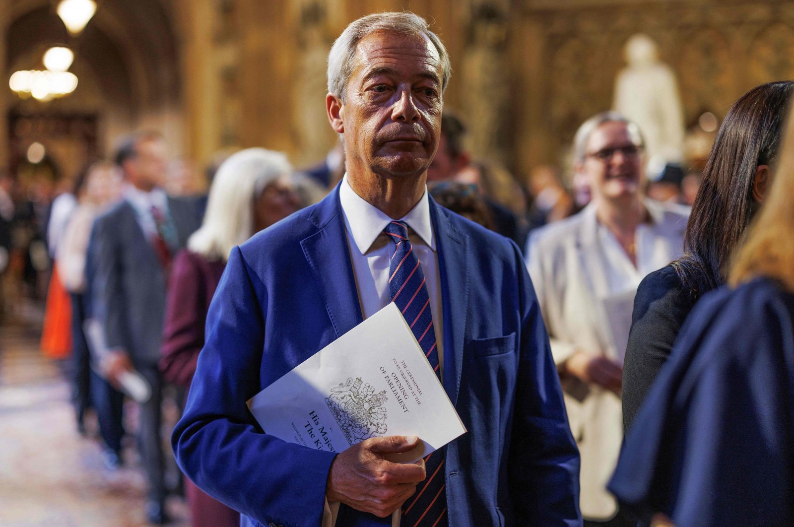 Reform U.K. leader Nigel Farage reacts as he processes through the Central Lobby during the State Opening of Parliament at the Houses of Parliament, in London, July 17, 2024. (AFP Photo)