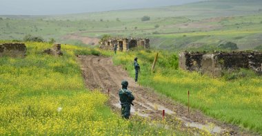 Azerbaijani border guards are seen in Ghizilhajili, one of the four villages Armenia recently returned to Azerbaijani control under a border demarcation deal between the Caucasus rivals, the Karabakh region, Azerbaijan, May 28, 2024. (AFP Photo)