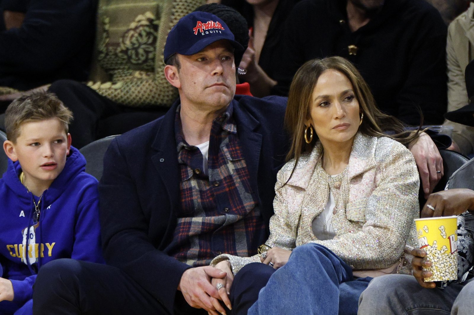 Jennifer Lopez, Ben Affleck and his son Samuel Garner Affleck attend a basketball game between the Los Angeles Lakers and Golden State Warriors at Crypto.com Arena in Los Angeles, California, U.S., March 16, 2024. (Getty Images Photo)