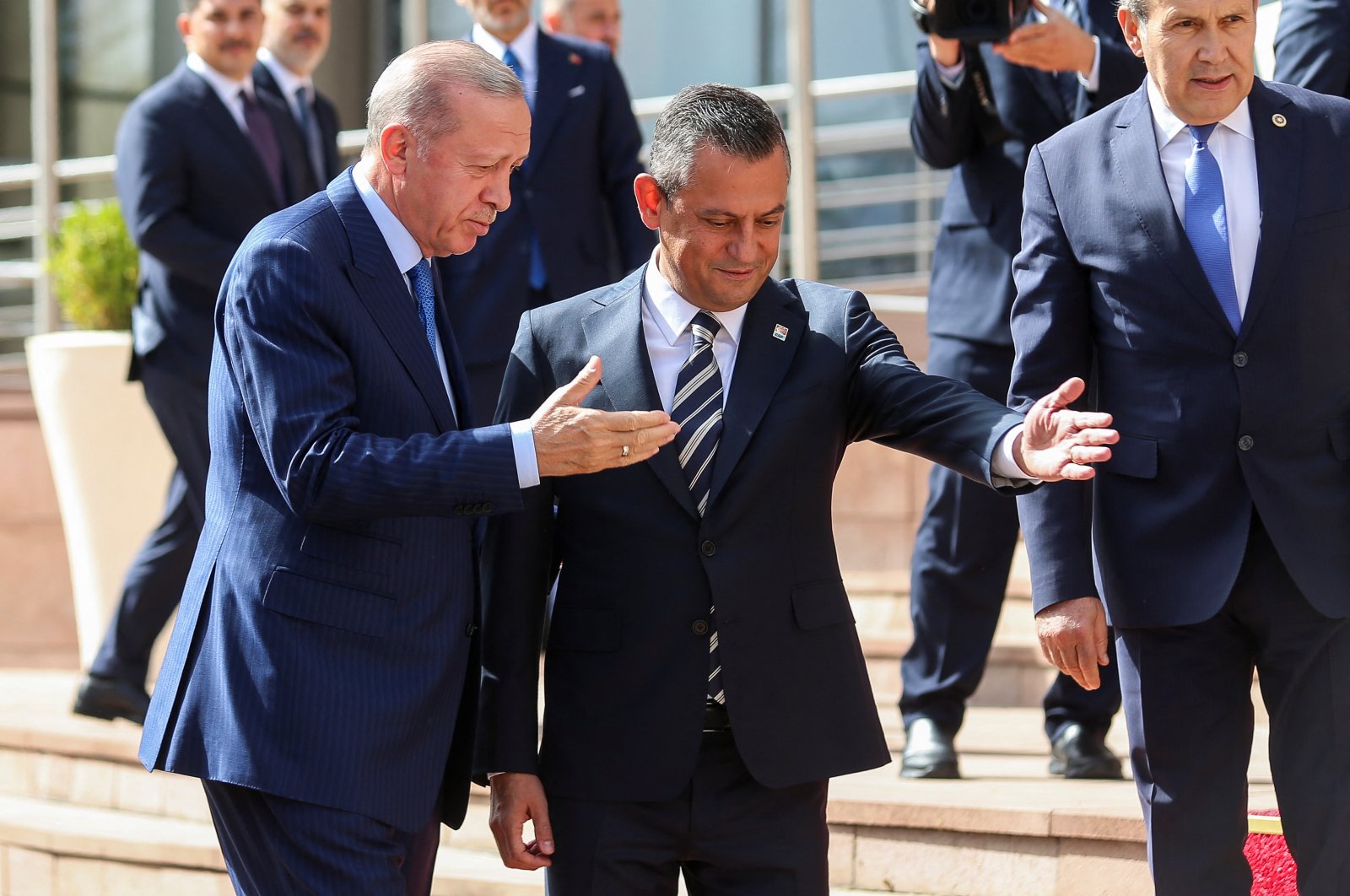 President and the leader of the ruling Justice and Development Party (AK Party) Recep Tayyip Erdogan is welcomed by Ozgur Ozel, leader of the main opposition Republican People’s Party (CHP), prior their meeting at the CHP headquarters, Ankara, Türkiye, June 11, 2024. (Reuters Photo)