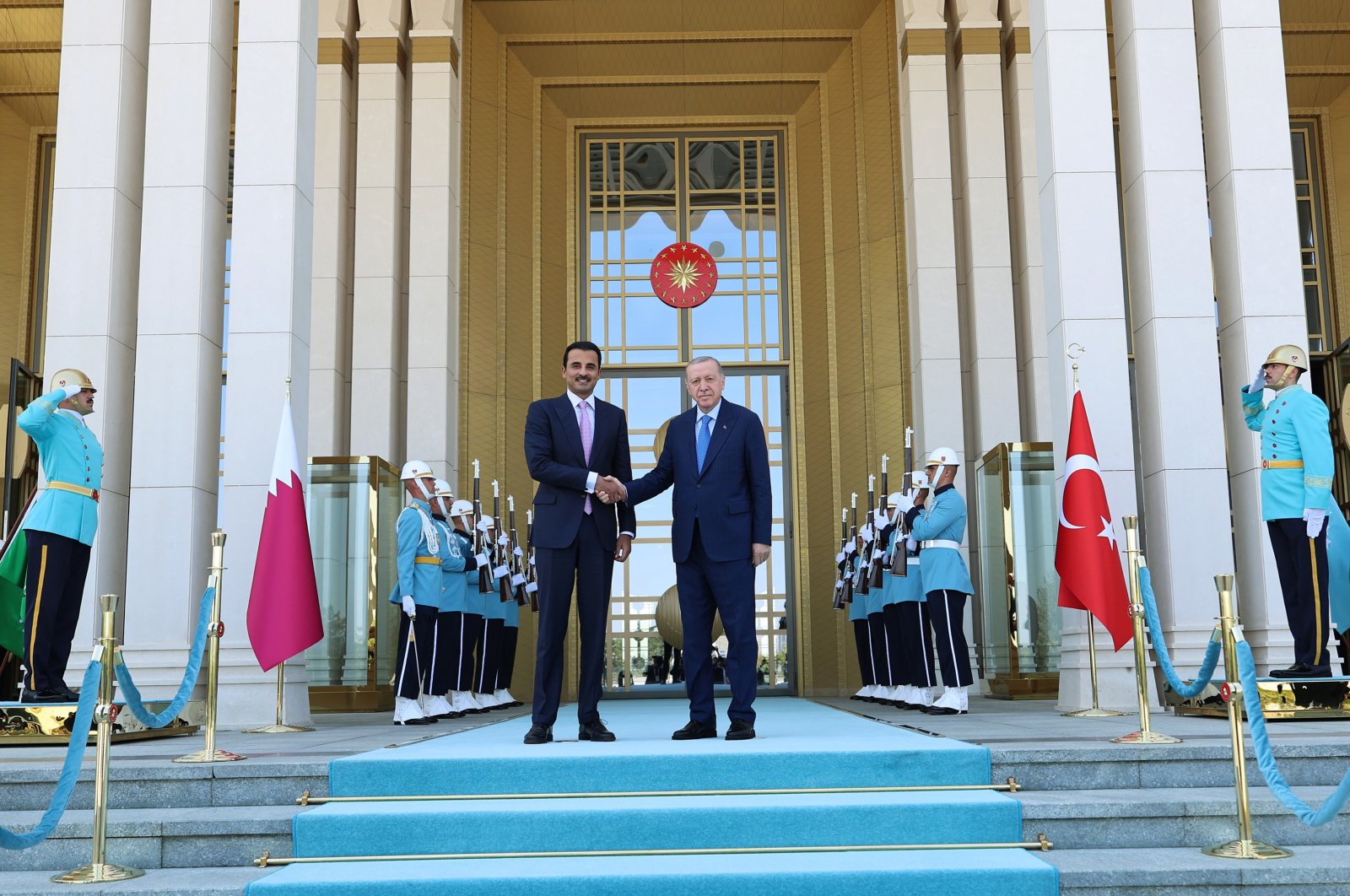 President Recep Tayyip Erdoğan shakes hands with Qatari Emir Sheikh Tamim bin Hamad Al Thani, Ankara, Türkiye, Aug. 8, 2024. (AA Photo)