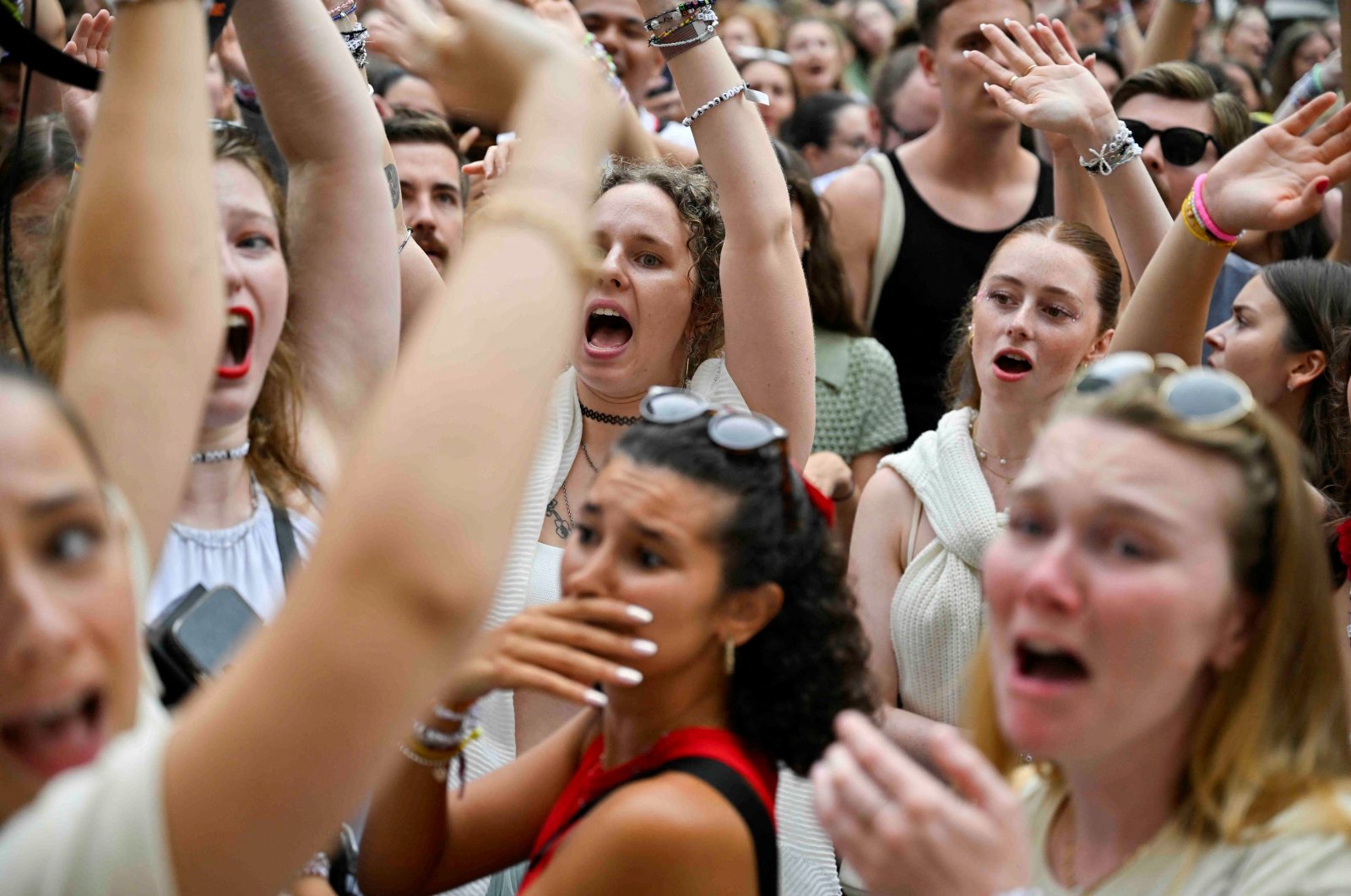 Fans of the singer Taylor Swift gather following the cancelation of three Taylor Swift concerts at Happel stadium after the government confirmed a planned attack at the venue, in Vienna, Austria, Aug. 8, 2024. (Reuters Photo)