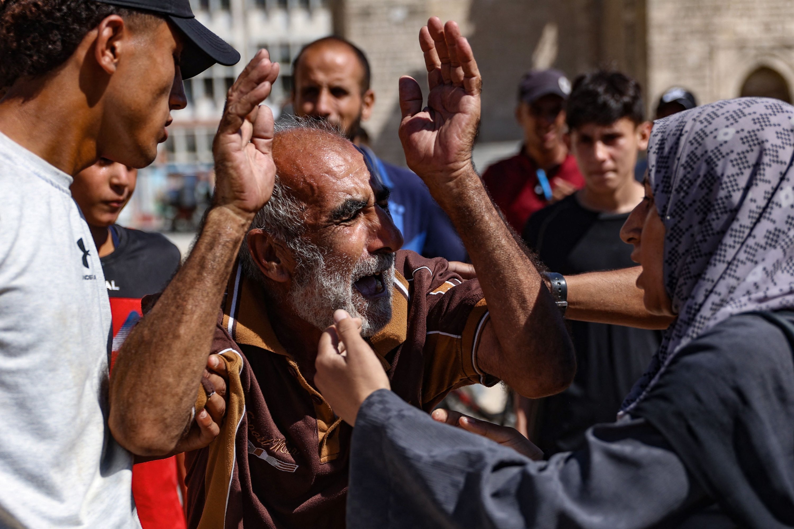 A Palestinian man reacts at the al-Zahra school used as a refuge by displaced Palestinians, after it was hit by an Israeli strike in the Shujaiya neighborhood, Gaza City, Palestine, Aug. 8, 2024. (AFP Photo)