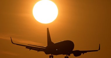 A commercial plane prepares to land at Ngurah Rai international airport in Denpasar, Bali, Indonesia, Aug. 4, 2024. (AFP Photo)
