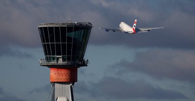 A British Airways Airbus A380 takes off in view of the control tower at Heathrow Airport, London, Britain, Nov. 28, 2023. (Reuters Photo)