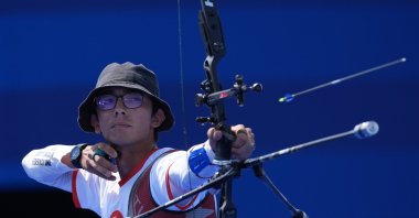Turkish archer Mete Gazoz in action during the first round of the classical bow of the Paris 2024 Olympic Games against Andres Gallardo Ferrada from Chile, Les Invalides, France, July 30, 2024. (AA Photo)