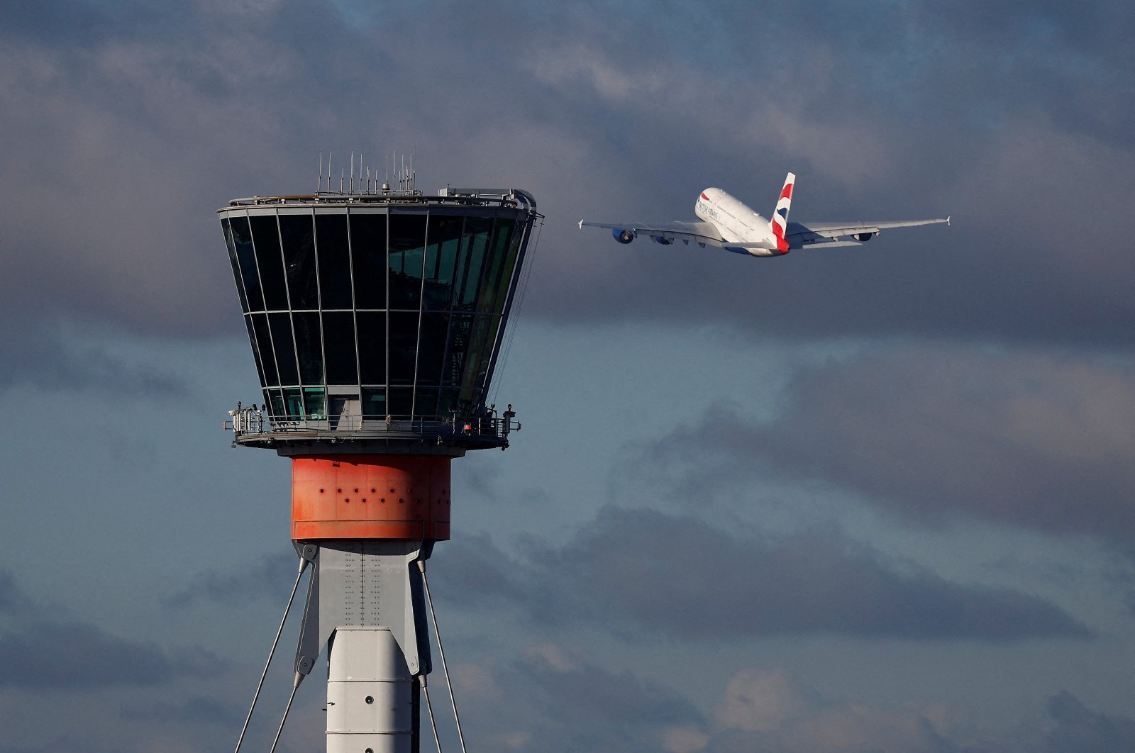 A British Airways Airbus A380 takes off in view of the control tower at Heathrow Airport, London, Britain, Nov. 28, 2023. (Reuters Photo)