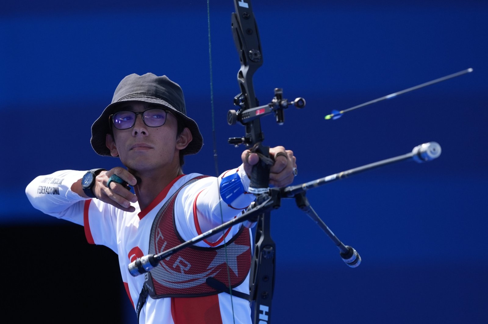 Turkish archer Mete Gazoz in action during the first round of the classical bow of the Paris 2024 Olympic Games against Andres Gallardo Ferrada from Chile, Les Invalides, France, July 30, 2024. (AA Photo)