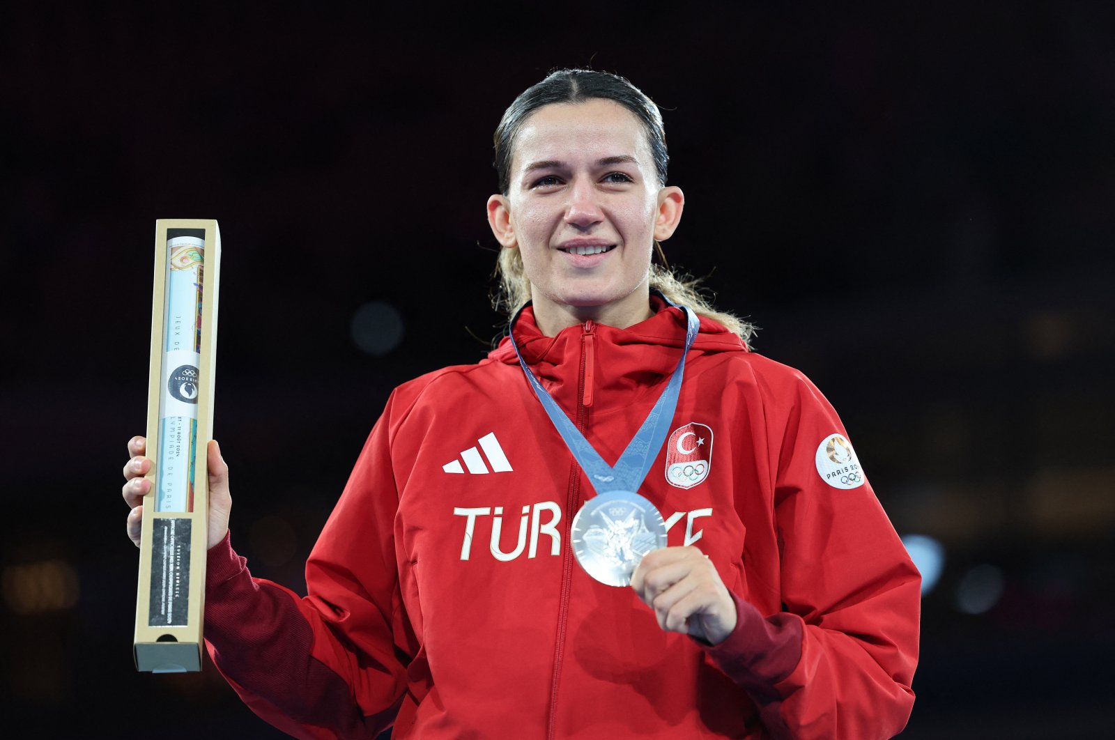 Turkish silver medallist Hatice Akbaş poses with her medal after the Paris 2024 Olympics Boxing Women&#039;s 54 kg. match against China’s Yuan Chang, Roland-Garros Stadium, Paris, France, Aug. 8, 2024. (Reuters Photo)