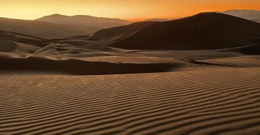 The Atacama Desert is best known for its salt lagoons in the north, but head to the Mar de Dunas in the southern part and you will be rewarded with perfect wind-sculptured wave patterns, Chile, March 27, 2022. (dpa Photo)