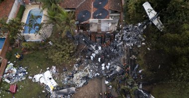 An aerial view shows Brazilian forensics working at the crash site in Vinhedo, Brazil, Aug. 10, 2024. (EPA Photo)