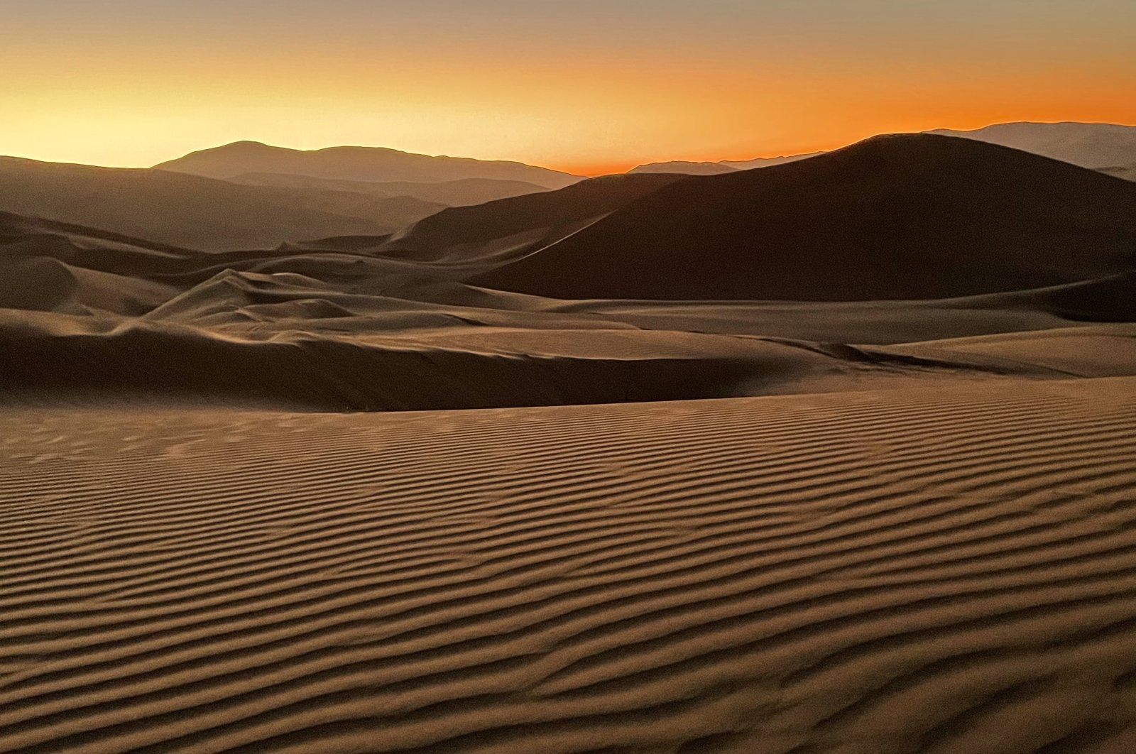 The Atacama Desert is best known for its salt lagoons in the north, but head to the Mar de Dunas in the southern part and you will be rewarded with perfect wind-sculptured wave patterns, Chile, March 27, 2022. (dpa Photo)