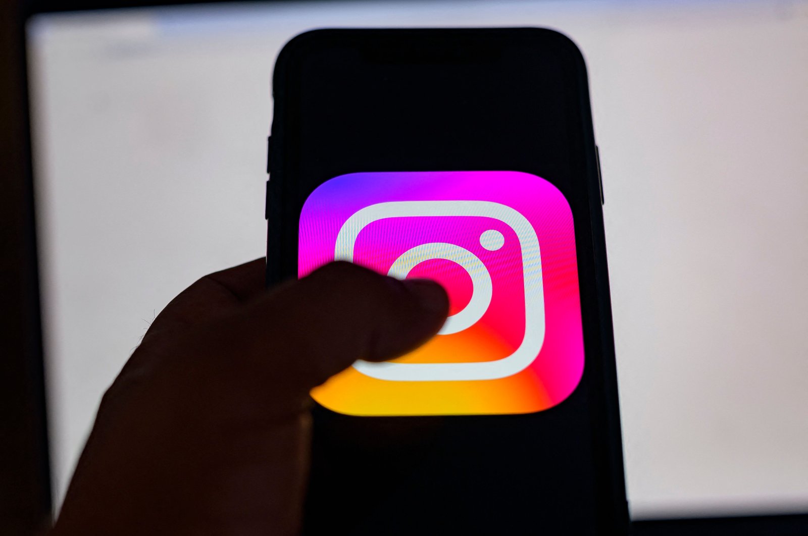 The logo of the social network Instagram on a smartphone, Istanbul, Türkiye, Aug. 2, 2024. (AFP Photo)