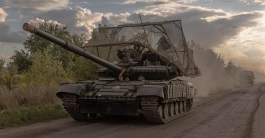 Ukrainian servicemen drive Soviet-made T-64 tanks in the Sumy region, near the border with Russia, Aug. 11, 2024. (AFP Photo)