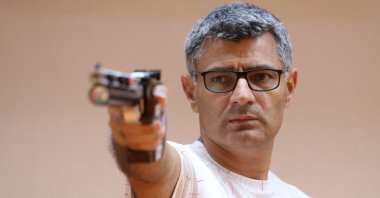 Turkish shooter Yusuf Dikeç, who won the silver in the mixed team 10-meter air pistol event in the Paris 2024 Olympics combined with Sevval Ilayda Tarhan, is pictured during training, Ankara, Türkiye, Aug. 8, 2024. (Reuters Photo)